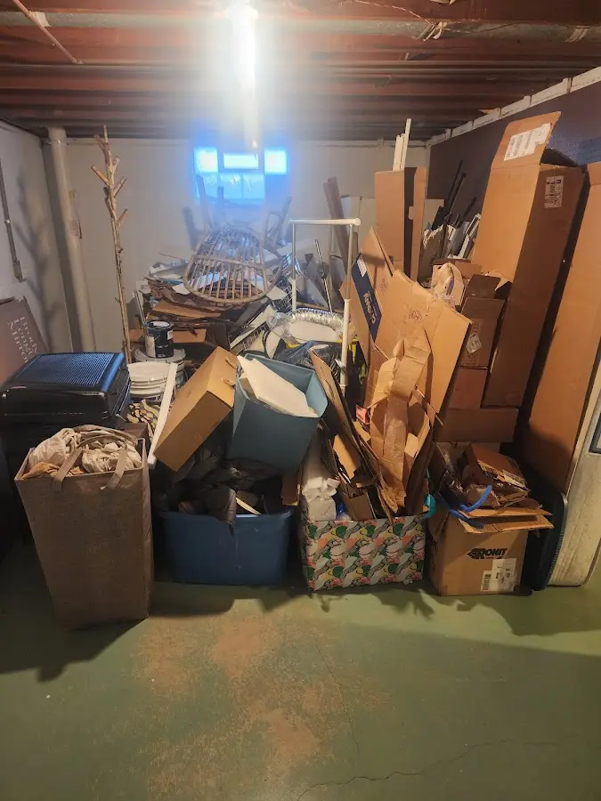 Roll-off dumpster container at job site for 15 Yard Dumpster Rental in Brunswick